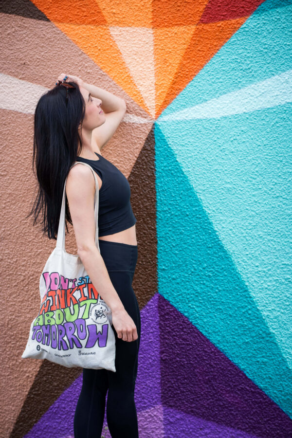 Portrait of a model in an urban street setting with graffiti background